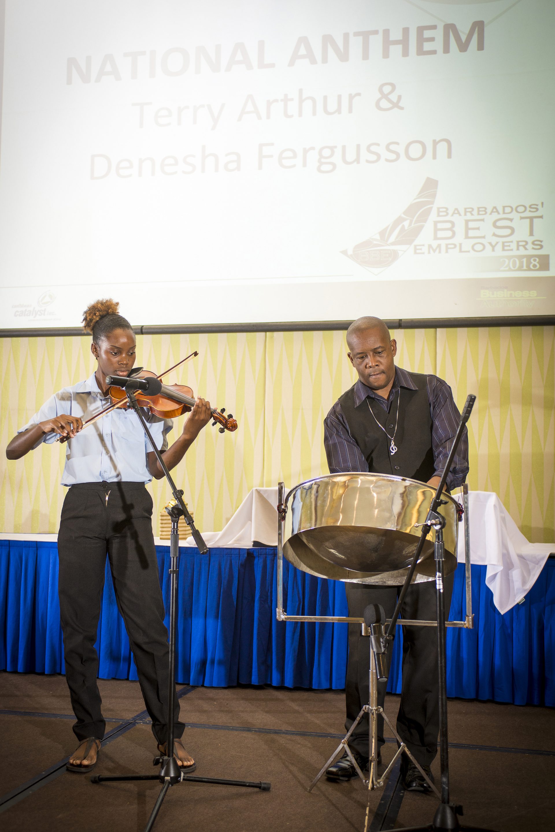 National Anthem was played by Terry Arthur on steel pan and Denesha Fergusson on violin